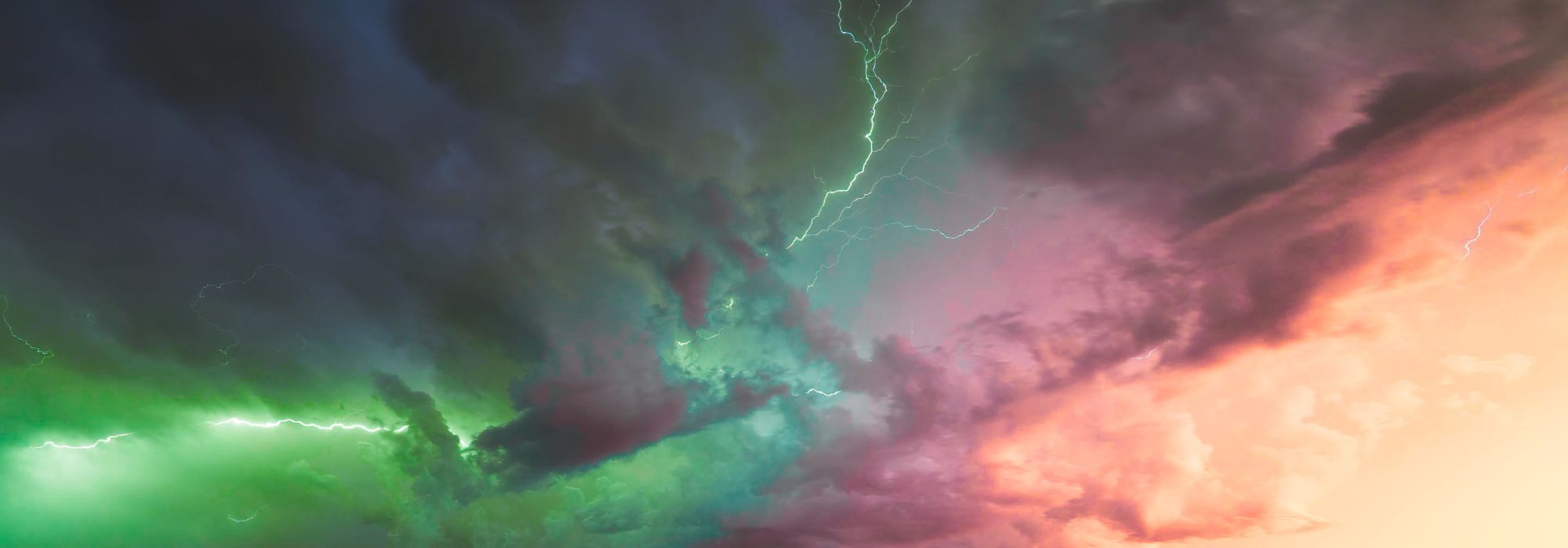 Green and pink sky with lightning crack down the middle