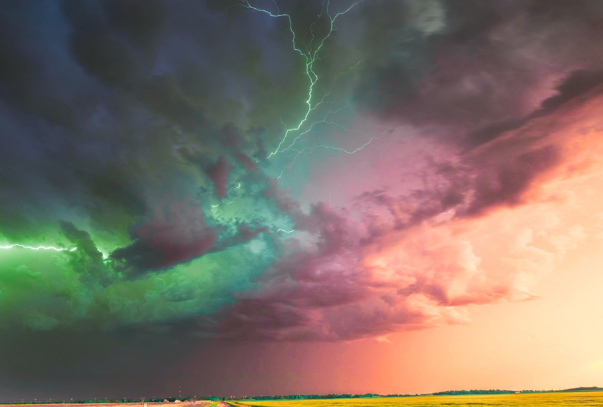 Green and pink sky with lightning crack down the middle