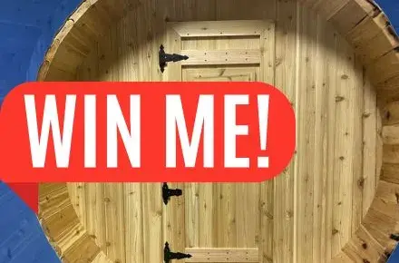 Barrel sauna - banner across says WIN ME
