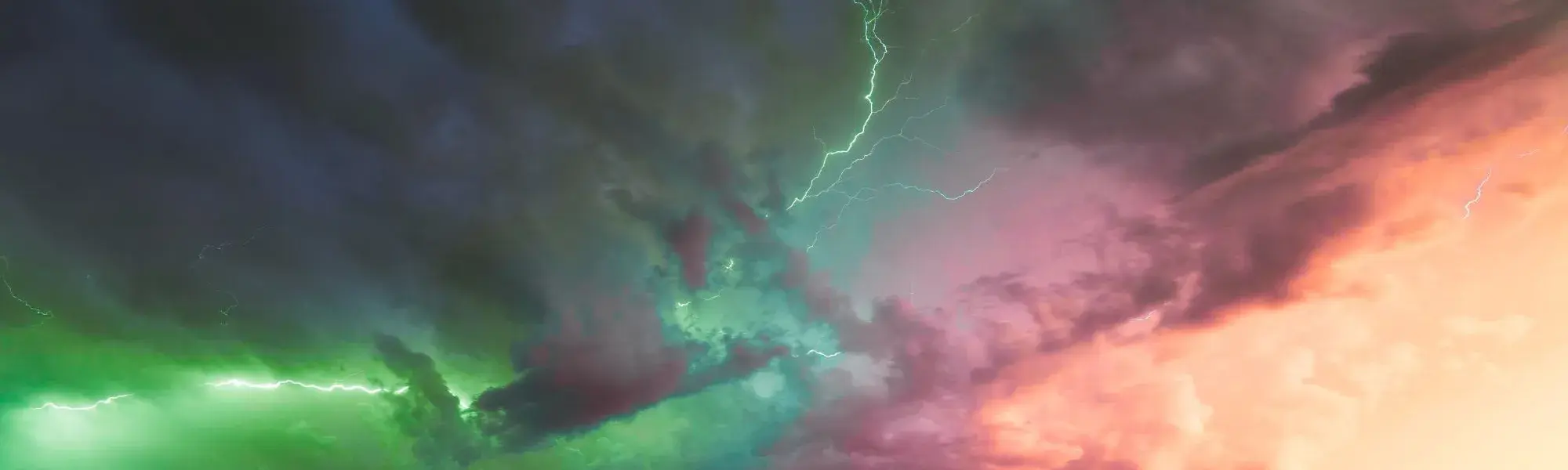 Green and pink sky with lightning crack down the middle