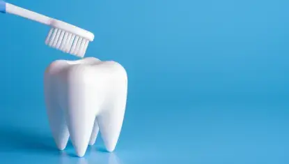 blue background, white toothbrush brushing white tooth